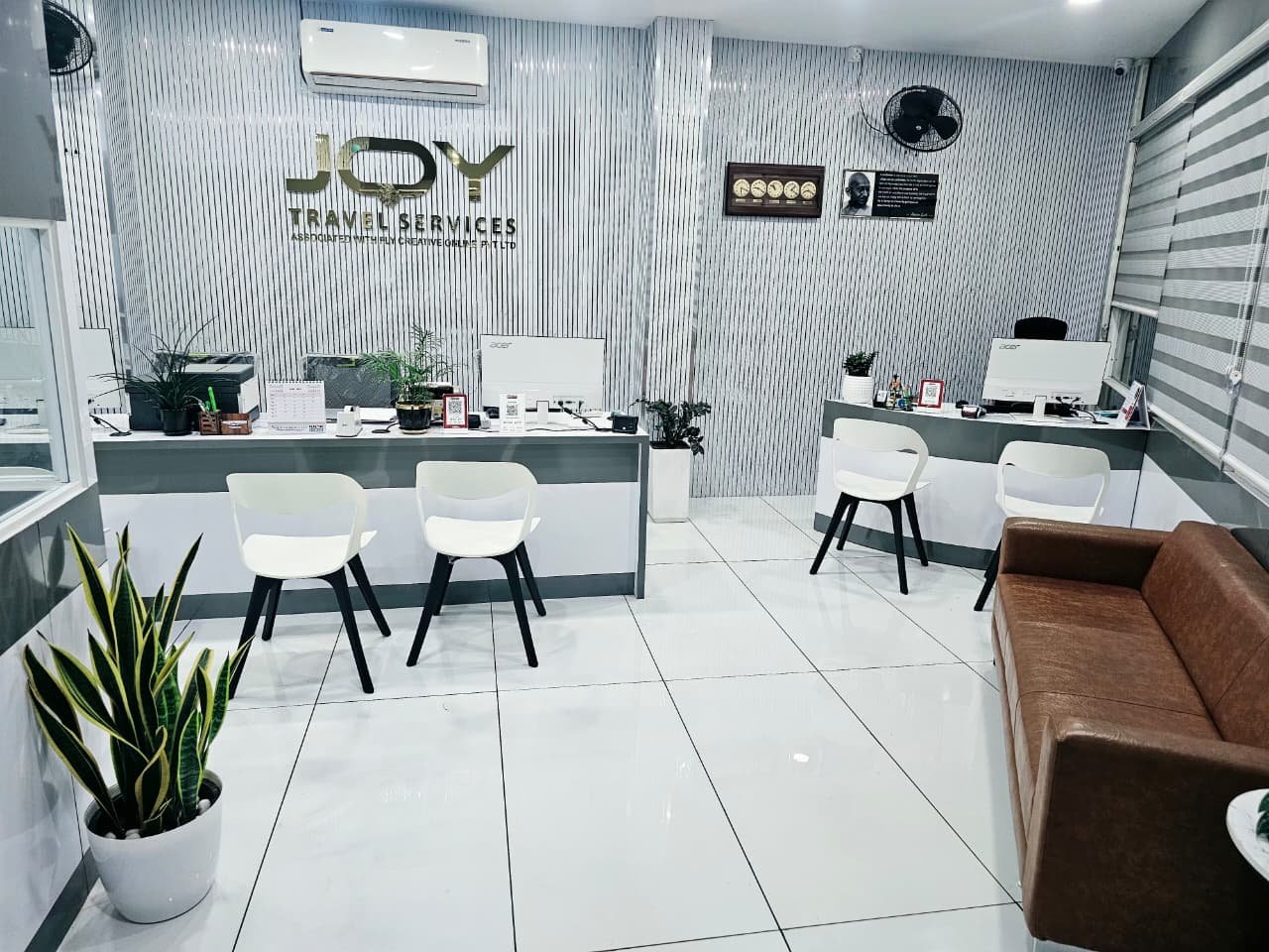 Customer consultation space at Joy Travel Services